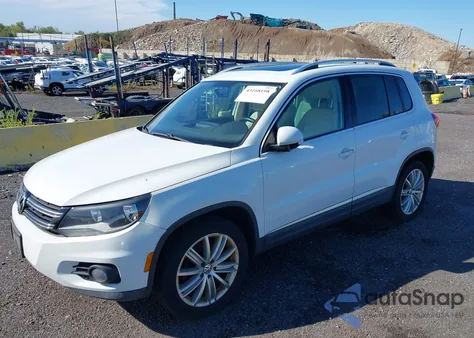2014 Volkswagen Tiguan Sel из США, поврежденный, VIN WVGBV3AX7EW601428